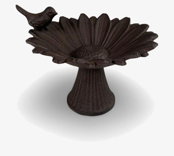 Bild av ett vackert fågelbad i gjutjärn för trädgården