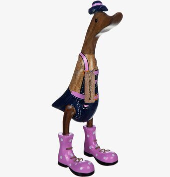 Foto av charmig trädskulptur: anka med stilfull design