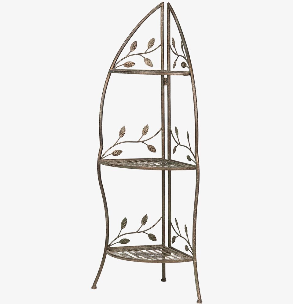 Foto av elegant grön metallhörnhylla med tre våningar