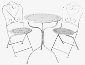 Bild av smakfullt utformat caféset i cremefärgad metall