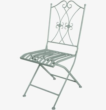 Bild av vintageinspirerad caféstol i mjuk grön nyans