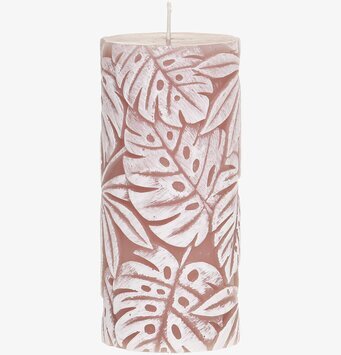 Bild av blockljus med bladmönster och rosa bakgrund