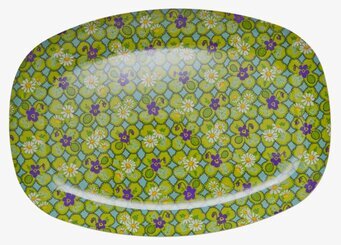 Bild av en färgglad och mönstrad tallrik med blommor