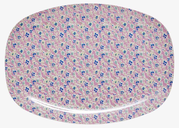 Bild av färgstark tallrik med blommönster och harmoni