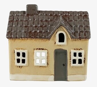 Foto av dekorativ ljuslykta i form av ett hus