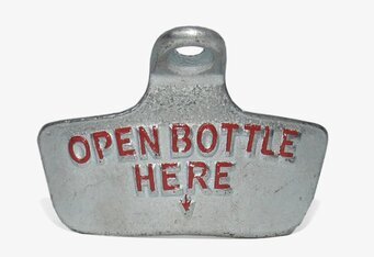 Bild av vintage kapsylöppnare i robust metallutförande