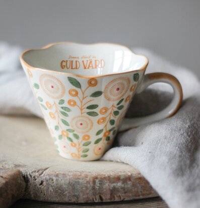Bild av estetiskt tilltalande mugg med blommönster