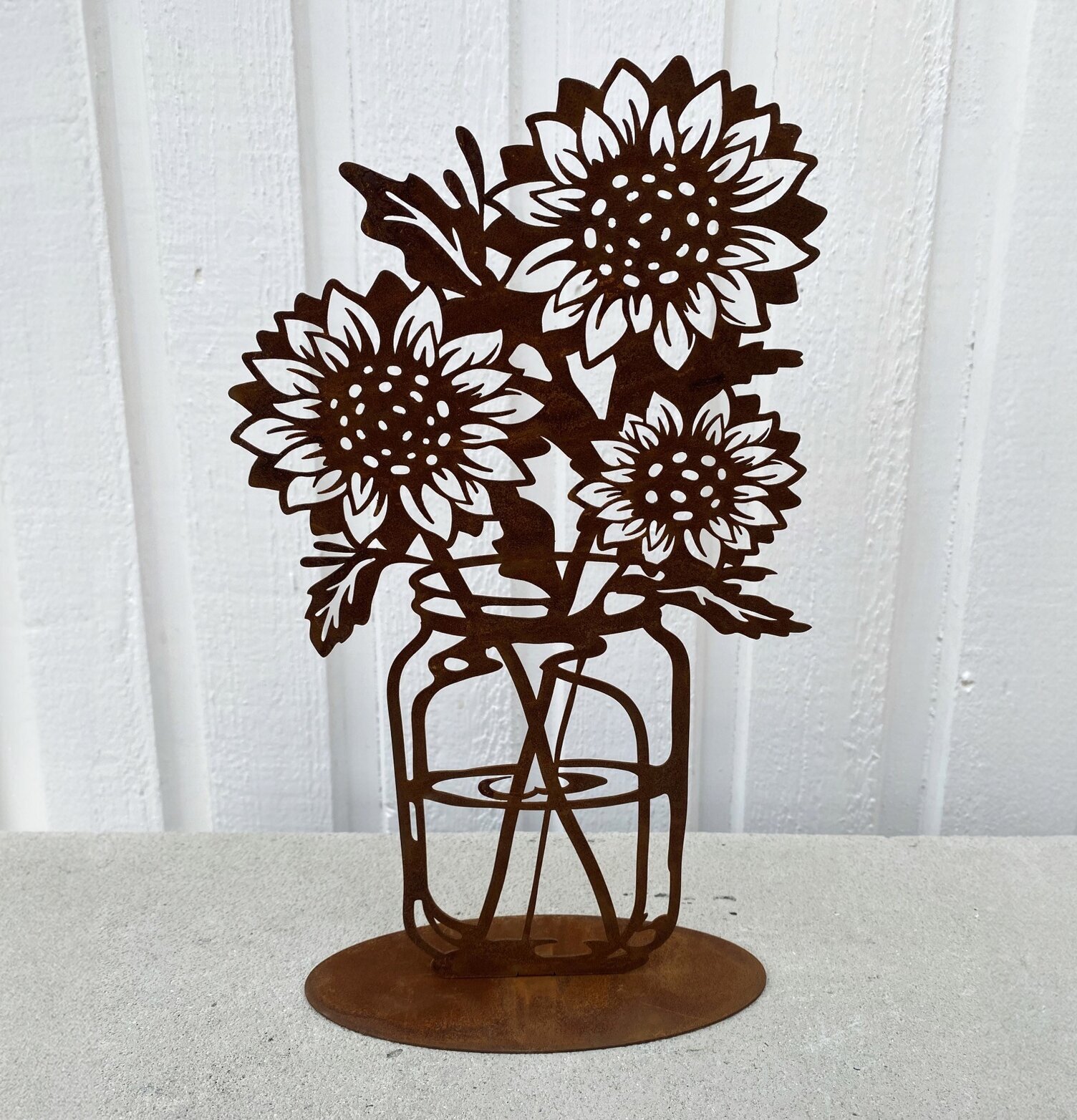 Solrosor I Vas Rost från Lind Decoration i rostig metall