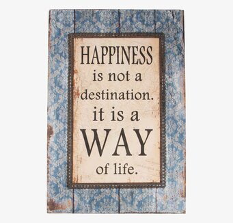 Bild av tavla med inspirerande budskap och vintage stil