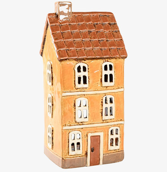 Bild av charmfull ljuslykta i form av ett hus