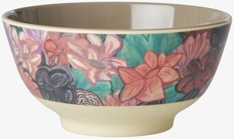 Bild av skål med livfullt blommönster och beige insida