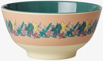 Bild av färgglad skål med blommönster och grön insida