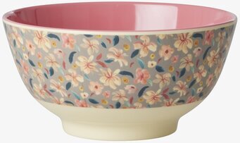 Bild av färgglad skål med livfullt blomstermotiv