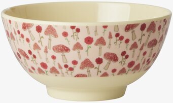 Bild av skål med rosa naturmotiv och livfull design