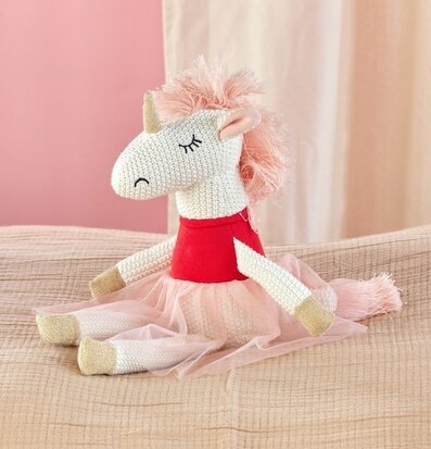 Bild av charmfull enhörningskudde med magiska detaljer