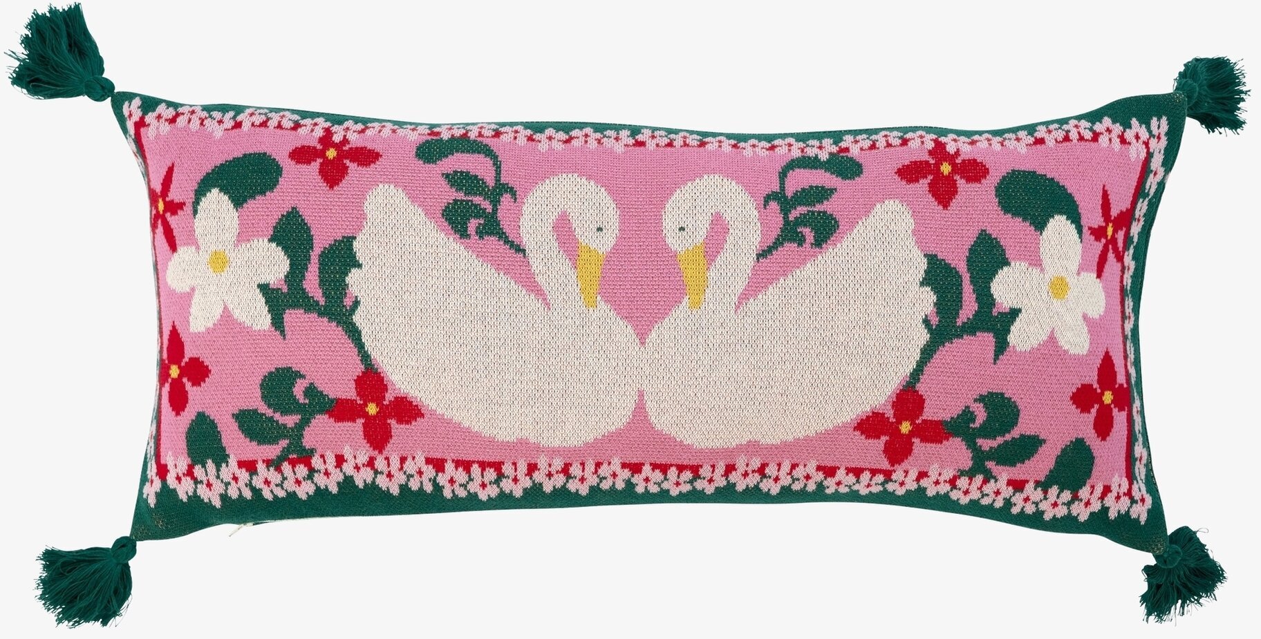 Bild av dekorativ kudde med svanar och blommor