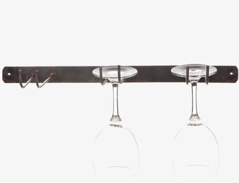 Bild av elegant väggmonterad glashållare i smide