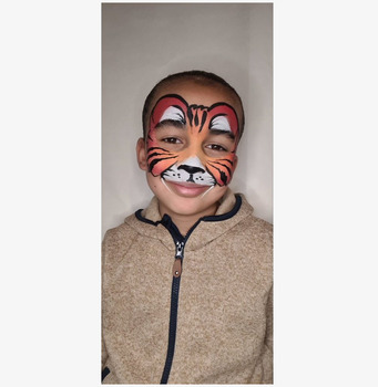 Bild av färgglad ansiktsmålning med djurmotiv