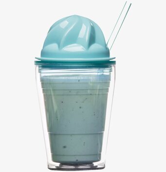 Bild av stilren milkshakebägare i ljusgrön design