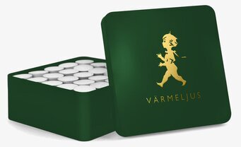 Bild av elegant plåtburk med värmeljus och stilren design