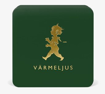 Foto av stilren grön plåtburk med guldiga detaljer