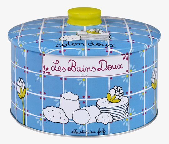 Bild av blå plåtburk med fransk elegans och blommönster