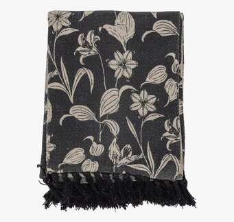 Bild av elegant pläd med blommönster och fransar