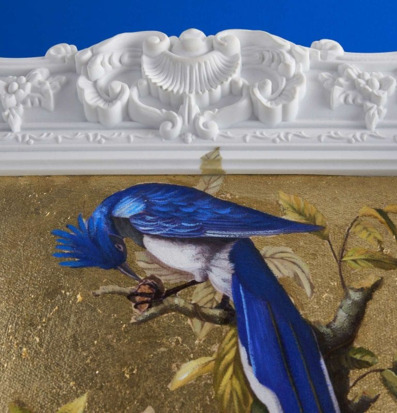 Bild av konstverk med fågel och gyllene bakgrund