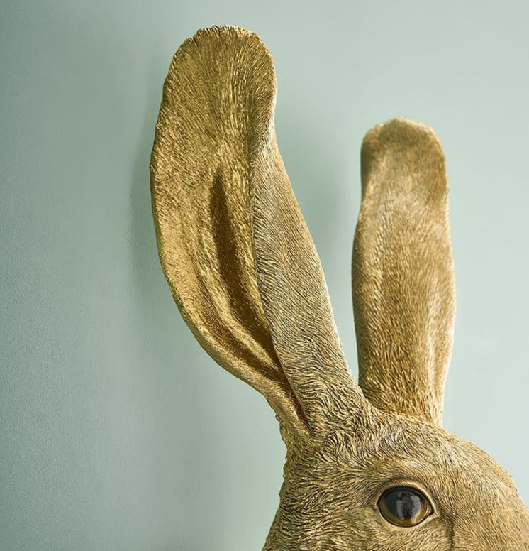Vägglampa Kanin Hasi Guld från Werner Voss på ljusgrön vägg