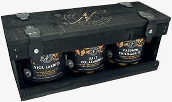 Bild av elegant och hållbar låda med lakritsburkar