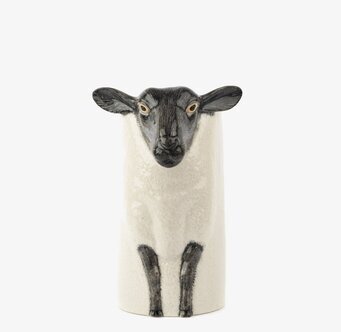 Bild av dekorativt keramikföremål med fårdesign