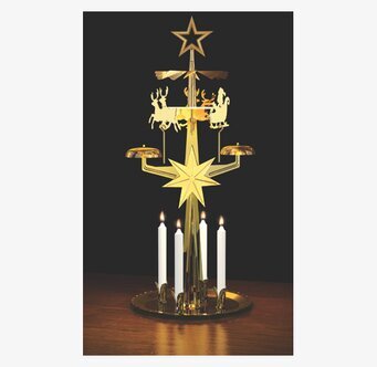 Foto av klassiskt änglaspel i mässing med ljus