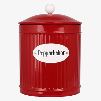 Bild av röd plåtburk för pepparkakor i köket