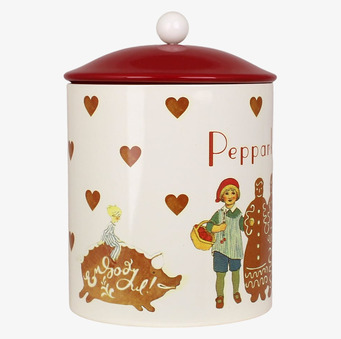 Bild av nostalgisk plåtburk med julmotiv och detaljer