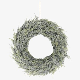 Bild av en elegant krans med snö och glittereffekt