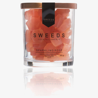 Bild av elegant och stilren godisburk med roségodis