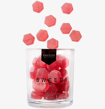 Bild av glasburk med unika hexagonala vingummin