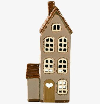 Bild av charmig ljuslykta i brun och beige färg