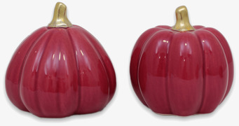 Bild av dekorativa hallonröda pumpor med gyllene skaft