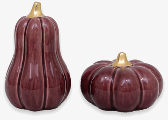 Foto av dekorativa auberginepumpor med gyllene stjälkar