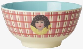 Bild av färgglad skål med kerub och rutmönster