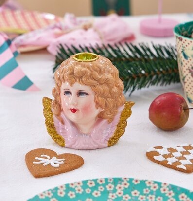 Bild av ljushållare: Änglahuvud med juldekorationer