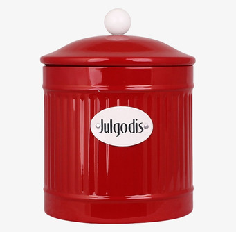 Bild av röd plåtburk för julgodis med nostalgisk design