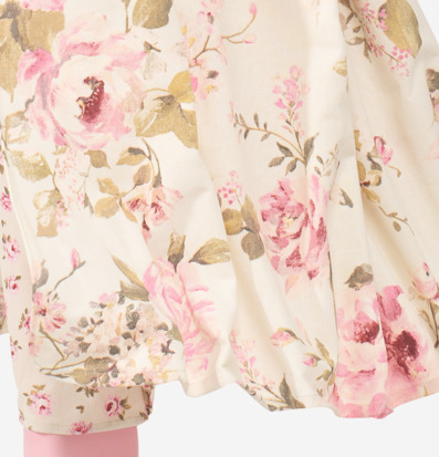 Bild av bordslampa med blommigt mönster och rosa bas