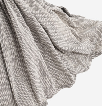 Foto av tyg med detaljerat vävt mönster och struktur