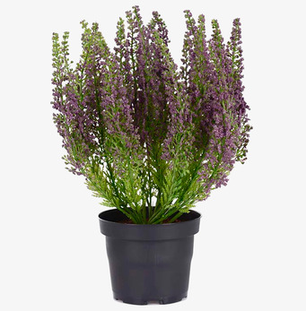 Bild av konstgjord växt i svart kruka med lila blommor