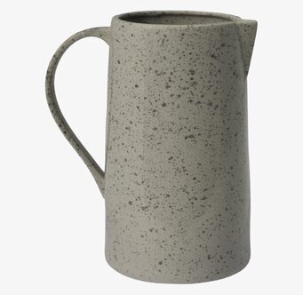 Bild av elegant kanna med subtilt fläckmönster