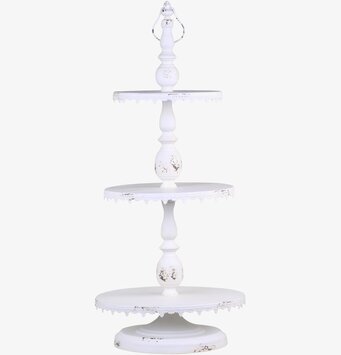 Bild av elegant treplans etagere med antik finish