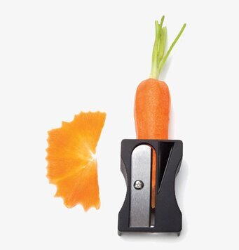 Bild av innovativ morotsskalare i minimalistisk stil
