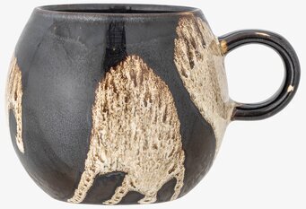 Foto av en elegant mugg i stengods med unik design